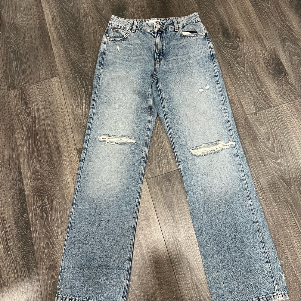 Blue Straight Leg Jeans with Distressed Details